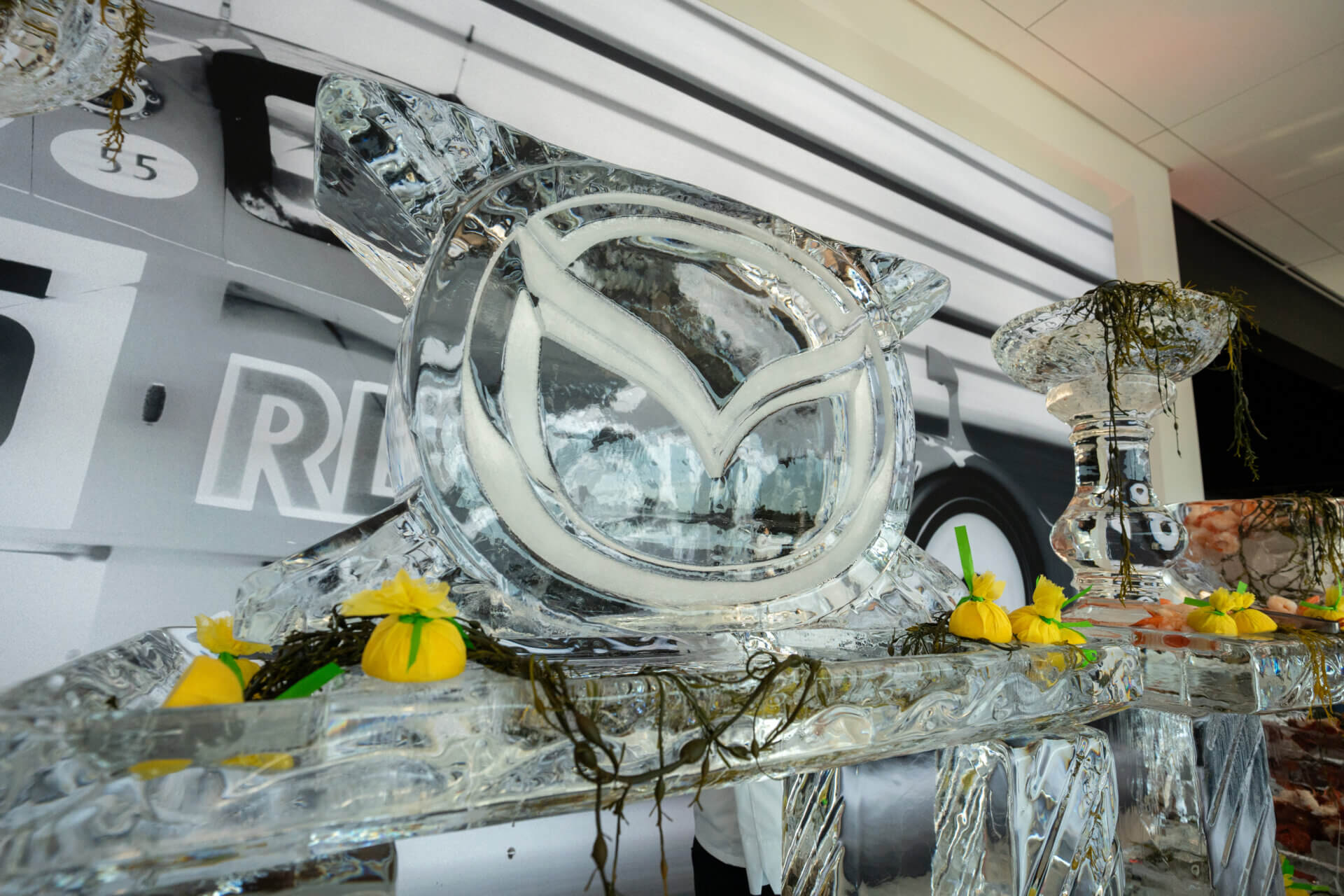 An ice sculpture featuring the Mazda logo for a ribbon cutting event at NJ car dealership Wayne Mazda.