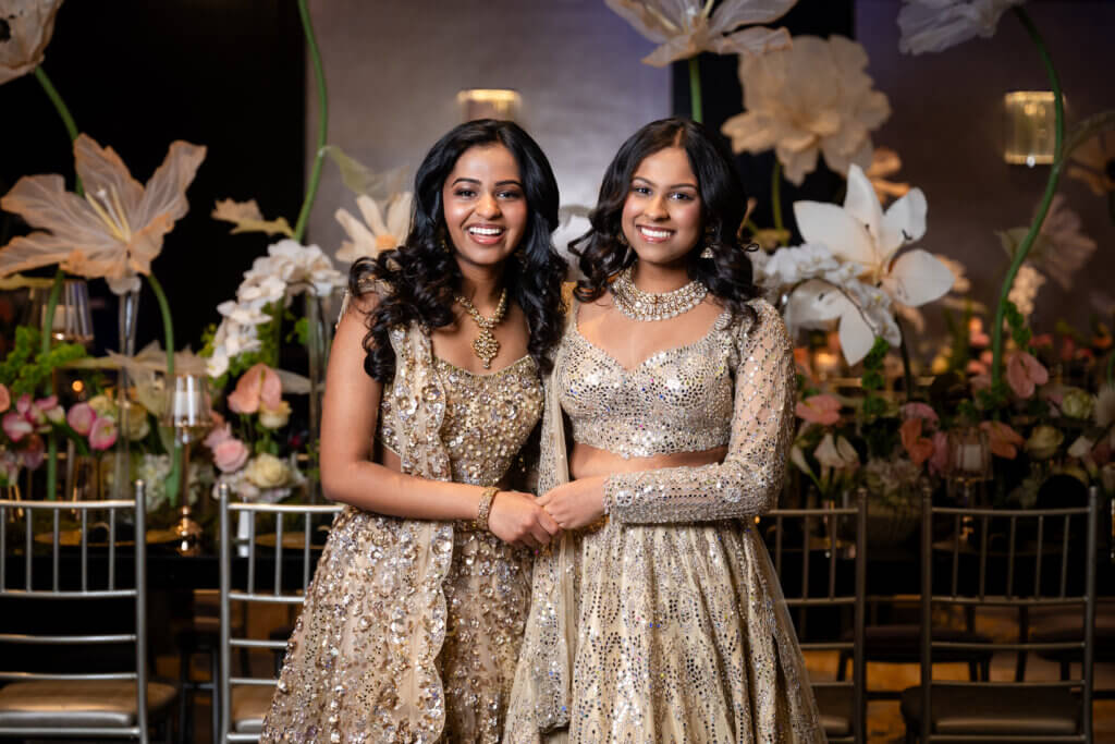A pair of Indian twin girls celebrating their Sweet 16